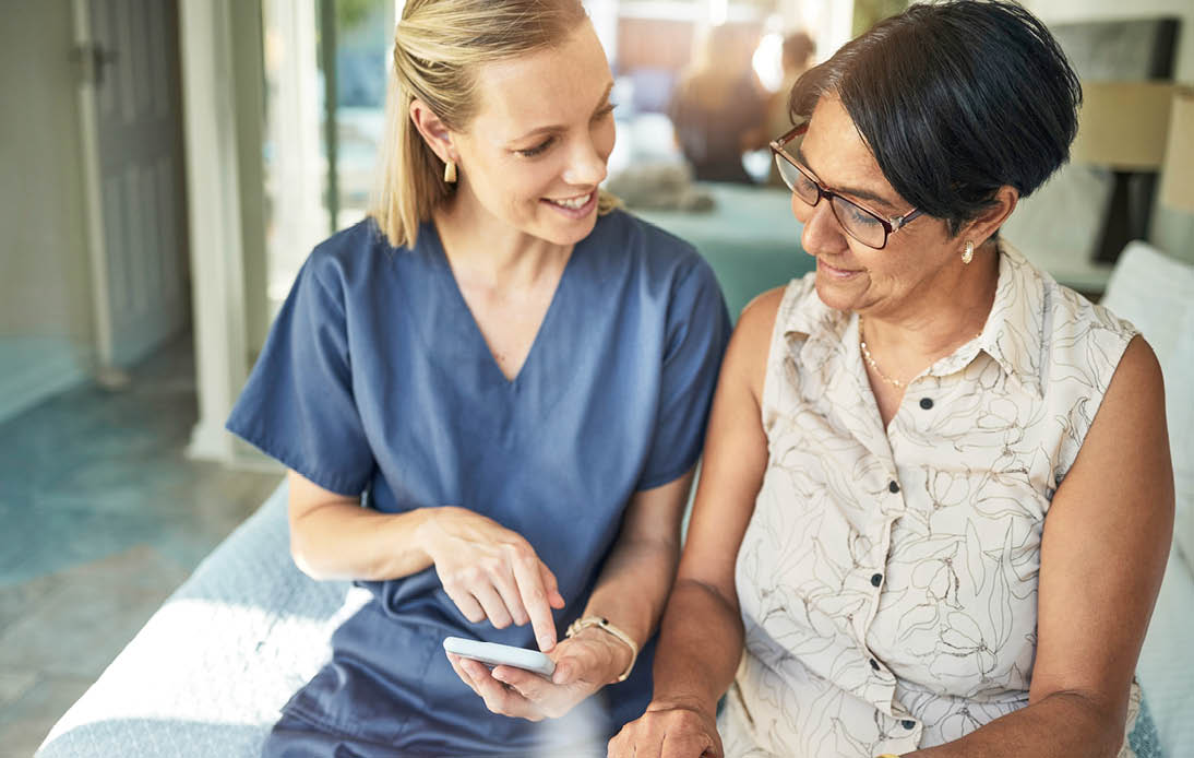 Happy woman, nurse and phone in elderly care for support, consultation or healthcare diagnosis at home. Female person, caregiver or medical professional on mobile smartphone to help senior patient.